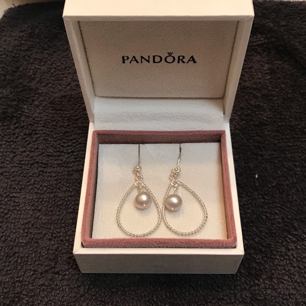 Never worn pandora earrings